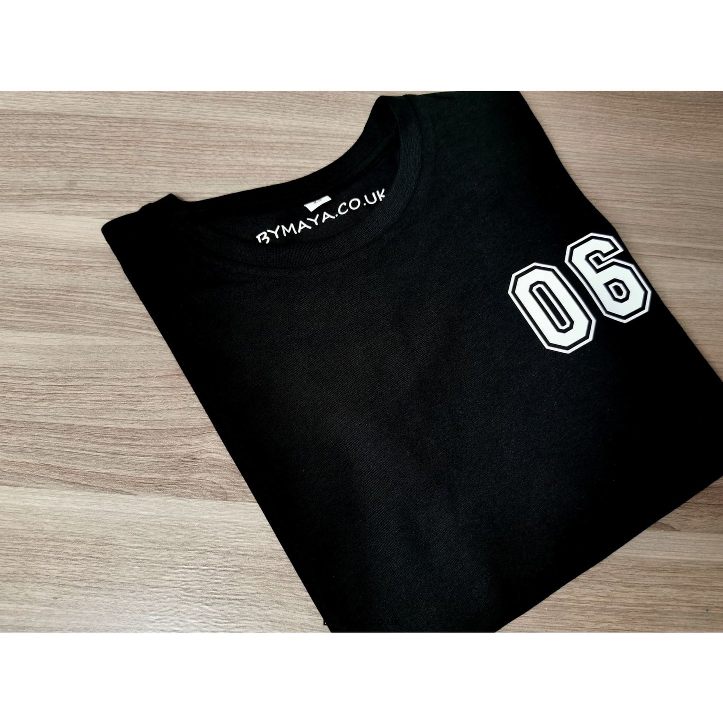 06 Varsity Number on a Ethically Made T-shirt - Women’s