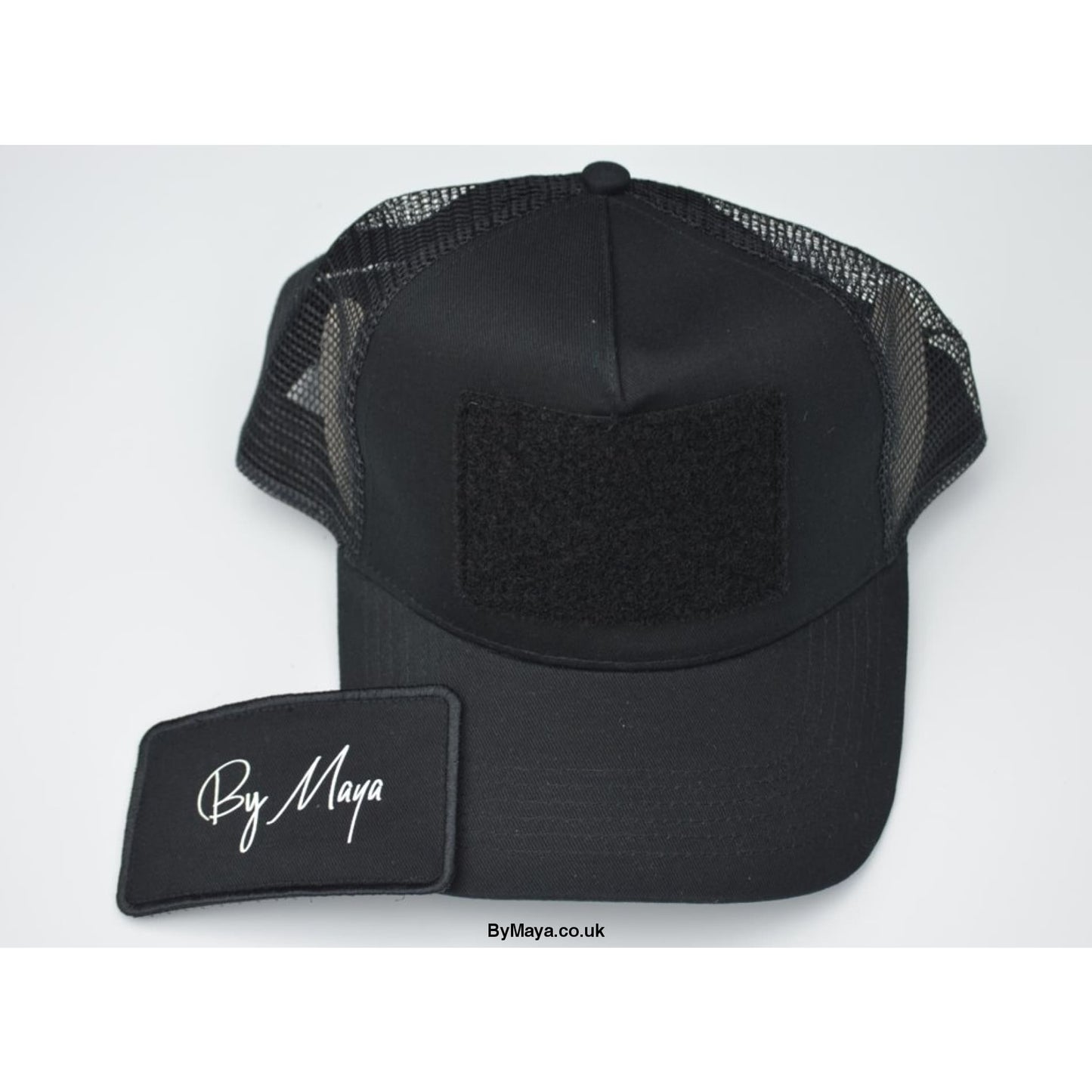 By Maya Logo on a Patch Snapback Trucker Cap Black - Men’s