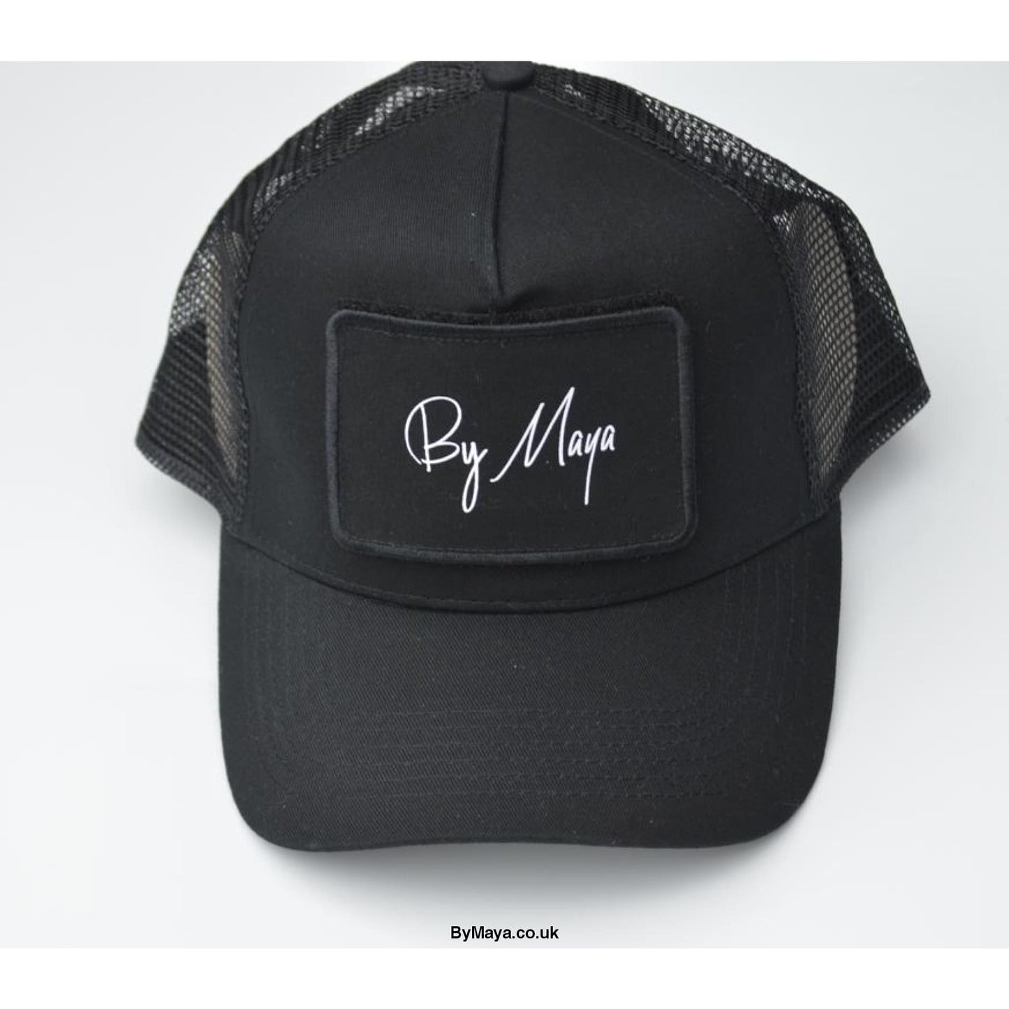 By Maya Logo on a Patch Snapback Trucker Cap Black - Men’s